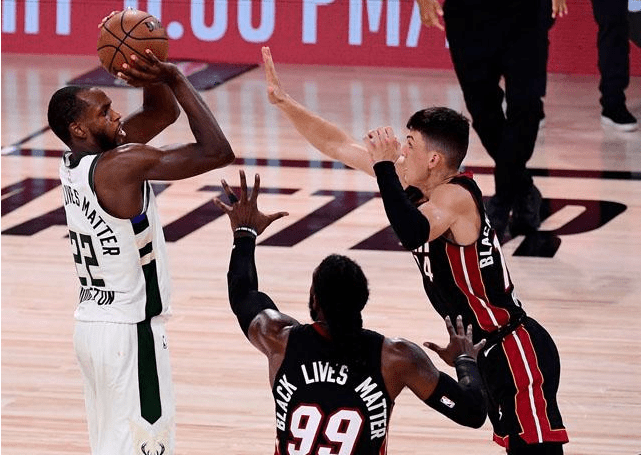  库里三分雨浇灭热火反扑  